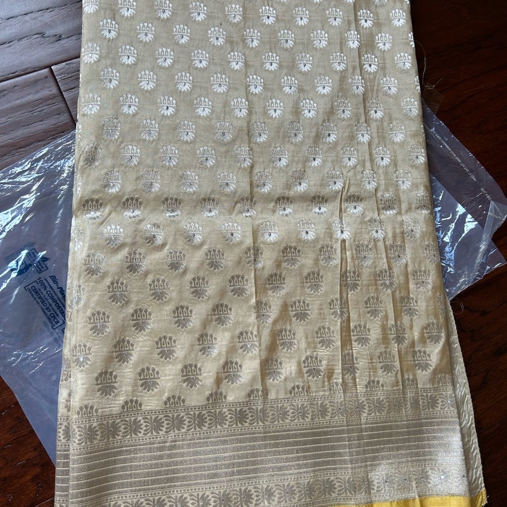 Gold and Cream Patterned Textile Saree